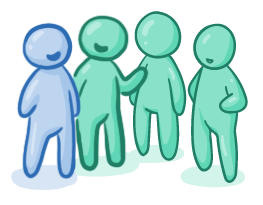 A group of people in discussion about community factors in well-being.